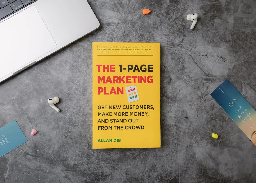 Planner open on a desk with handwritten Holiday Email Marketing Series note.